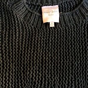 Romeo and Juliet sweater, short sleeved and dark gray, baggy and cozy design.